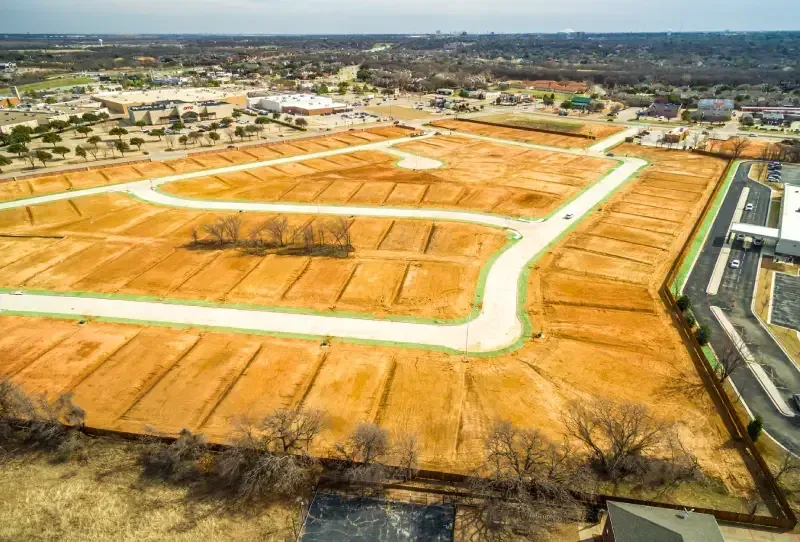 Aerial view of a new residential subdivision with finished streets