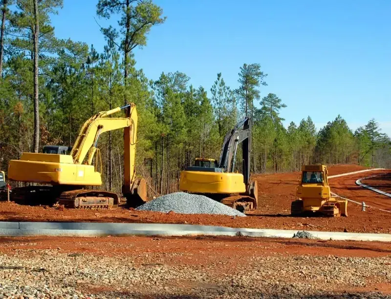 Excavators preparing a residential development site